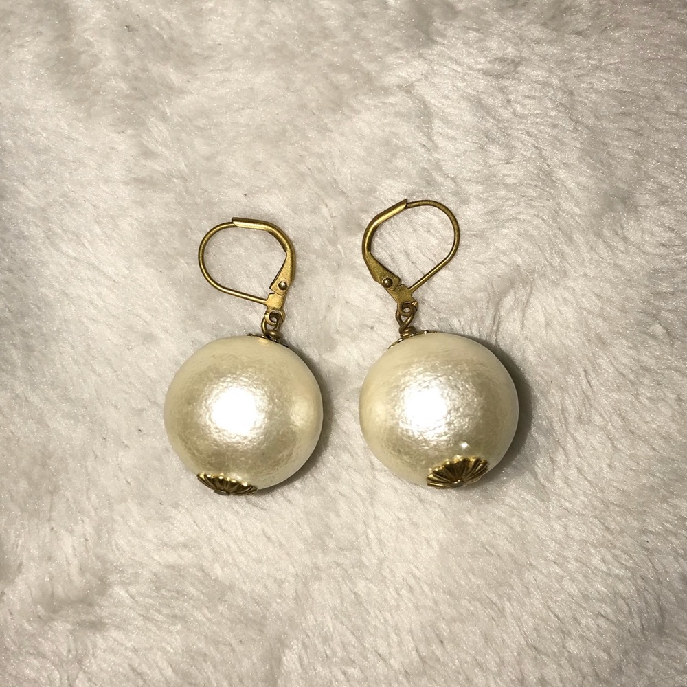 Never worn John Wind cotton ball earrings